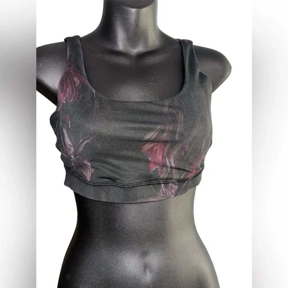 LULULEMON black crisscross sport bra with dark floral pattern